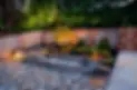 iStock-508072701-lazy-landscaping-backyard-with-hardscaping.jpg.webp