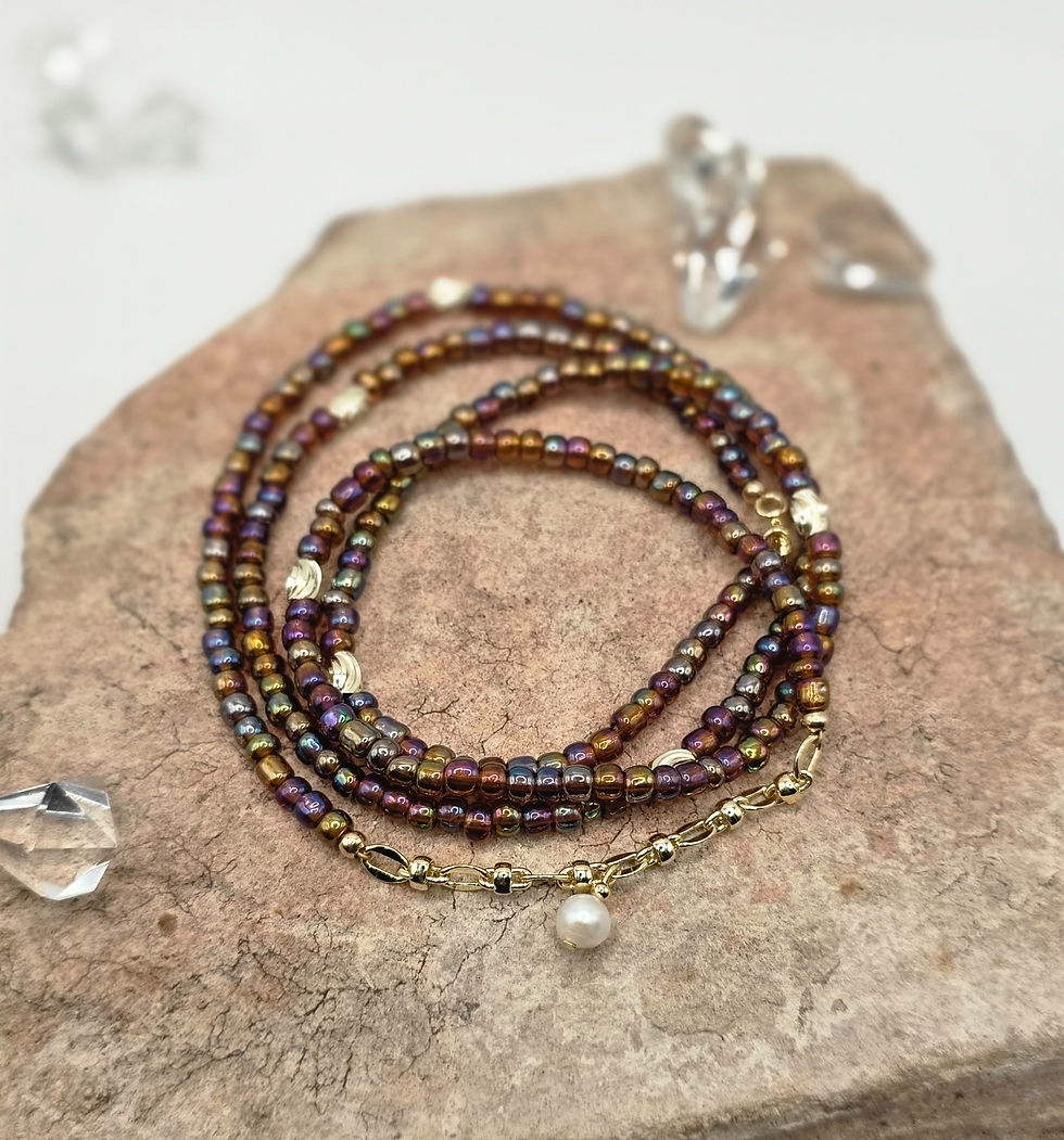 Tortoise Rainbow Pearl Fall waist chain with gold‑filled accents and a single freshwater pearl.