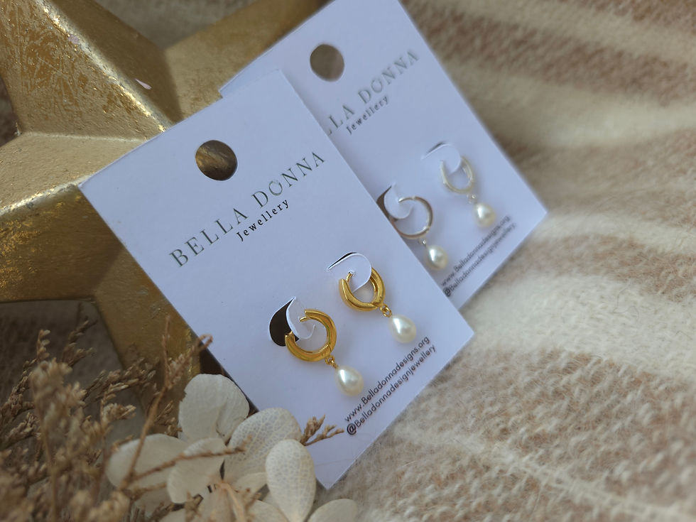 Thumbnail: Pearl drop huggie hoop earrings