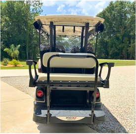 Golf cart with trailer hitch installed