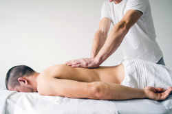 Male on Massage Table Back.jpeg