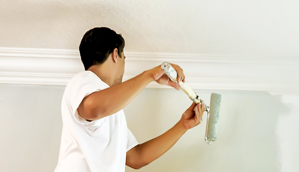 Man Painting Wall