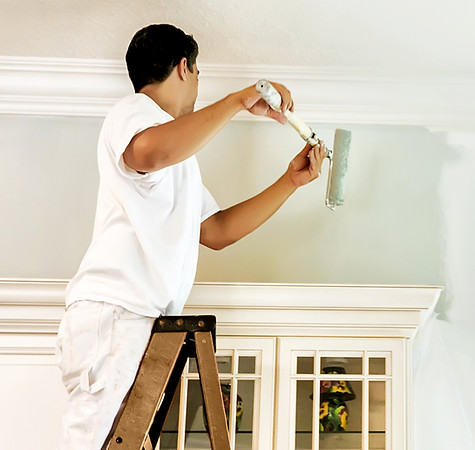 Man Painting Wall