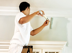 Man Painting Wall
