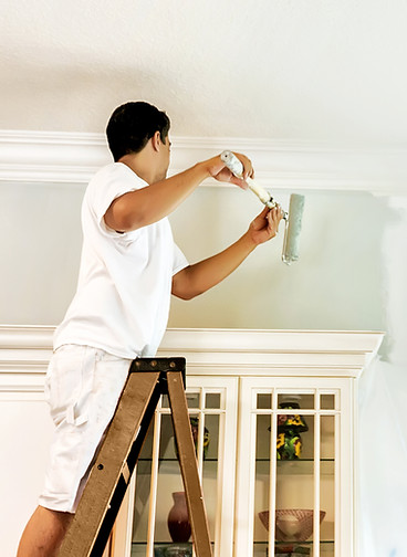 Man Painting Wall