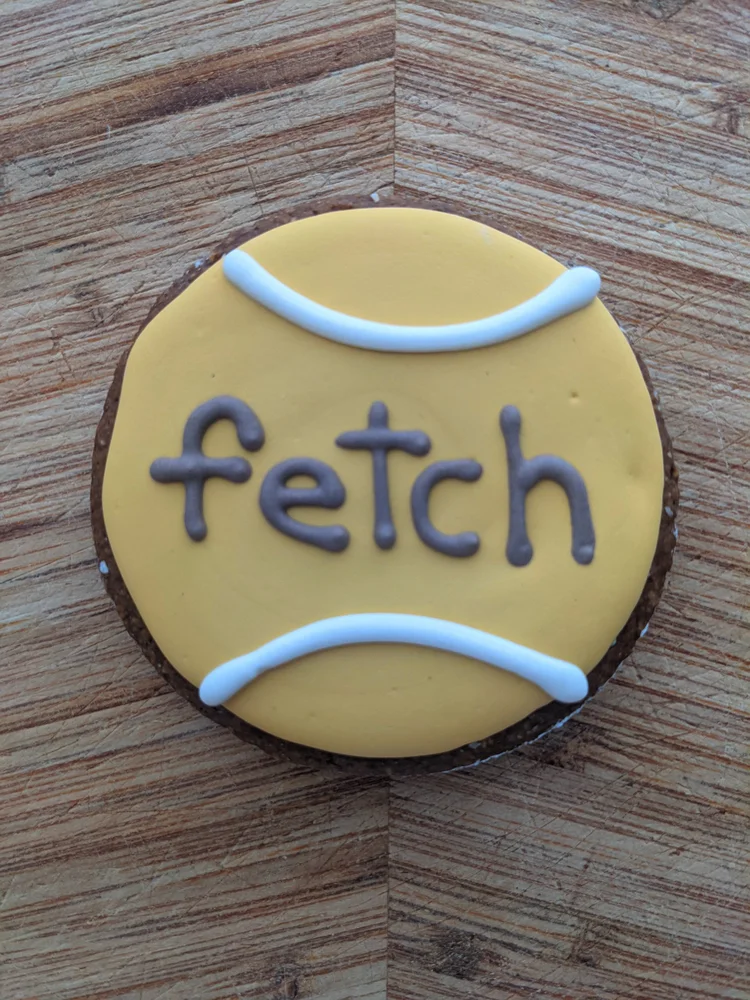 "Fetch" tennis ball cookie by Red Dog Bakery
