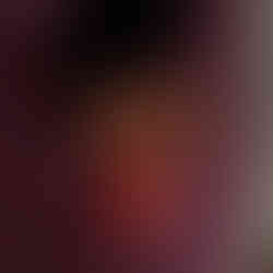 What looks like a cute little sugar glider snacking on a piece of strawberry