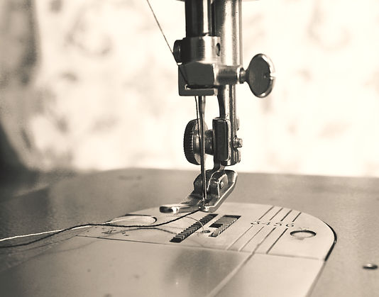 gray scale photo of sewing machine_edite