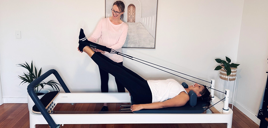 A private clinical Pilates session on the Reformer