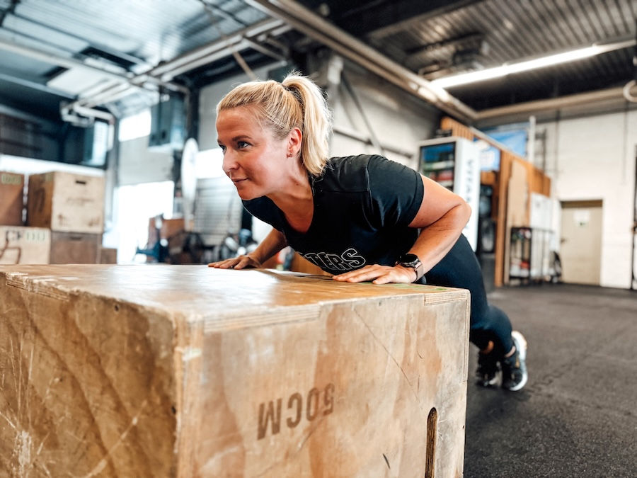 Athlete on a wooden plyo box