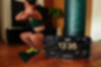 Woman training with dumbbells at home