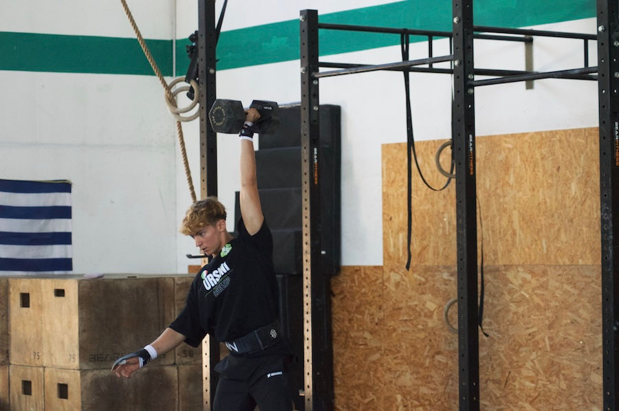 Athlete training with a dumbbell