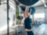 Female athlete with a barbell