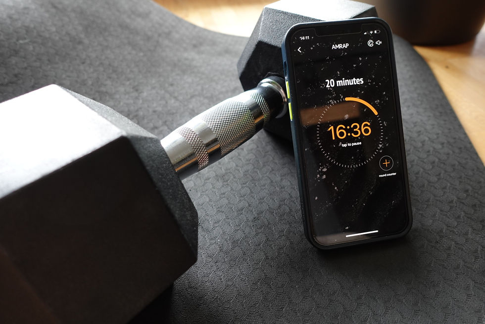 Athletes using a visible timer during a short strength-training session