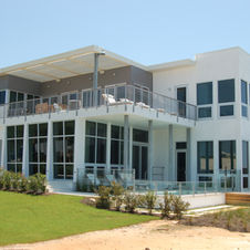 Curtainwall and windows installed by Area Glass at a residence in Seaside, Florida.