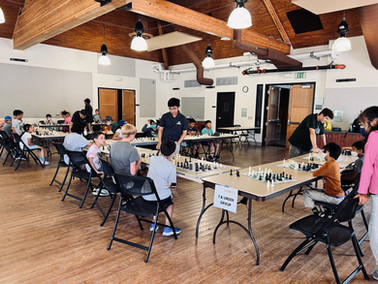 Chess players participating in a chess simul at our summer camps in Orange County