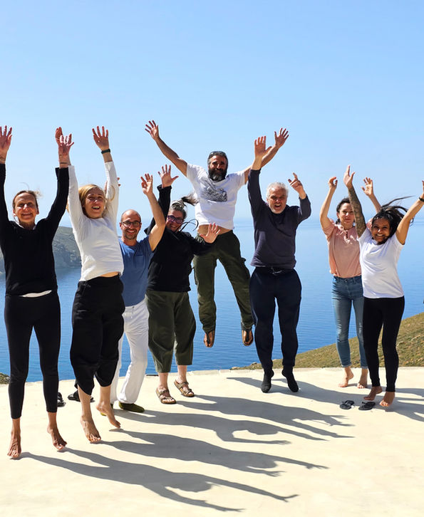 Group of people jumping with joy VIJAYA YOGA yoga retreats in greece.