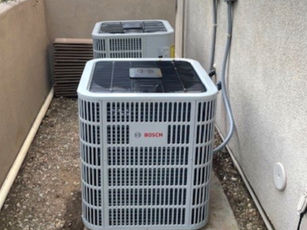 Two Bosch residential HVAC units installed next to each other in Gold Canyon