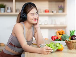 A woman practicing mindful eating with her GLP-1 diet plan. 