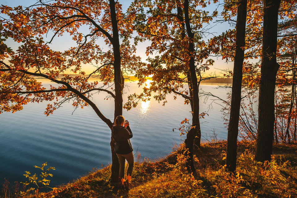 Kaunas, a person taking photo of a lake