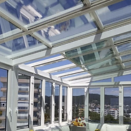 Retractable glass roof veranda