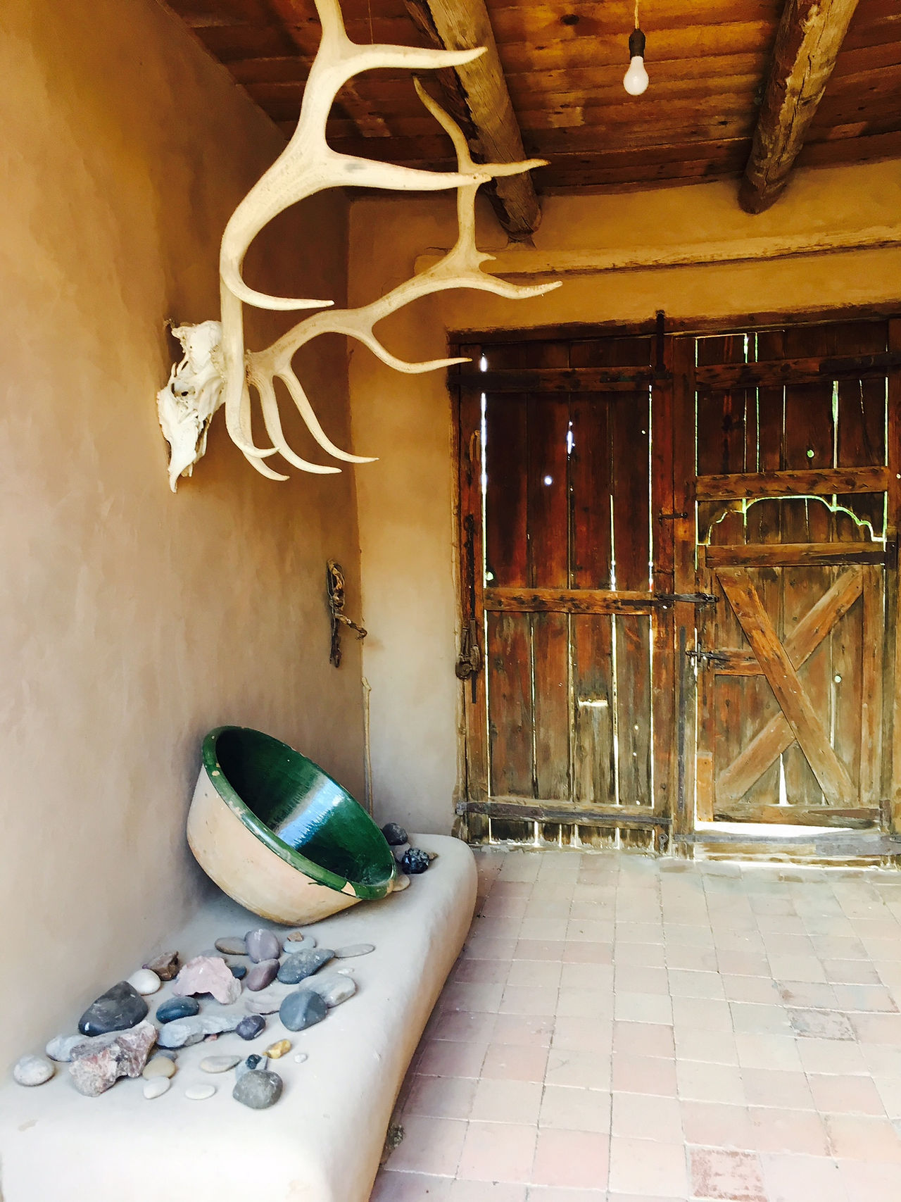 Georgia O'Keeffe's collected items still lay in organized groups around the grounds and inside the house.