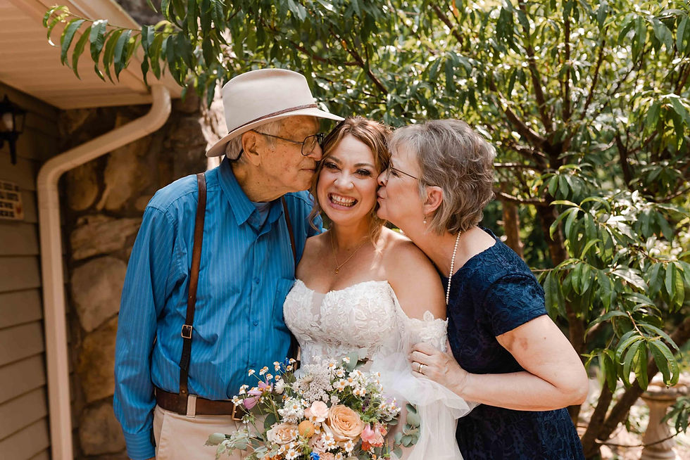 jessi casara and her parents on her wedding day