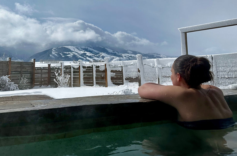 girl with good energy in a mountain hot tub