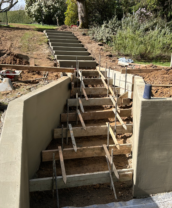Retaining wall installed and forms for stairs are installed in Portland, Oregon