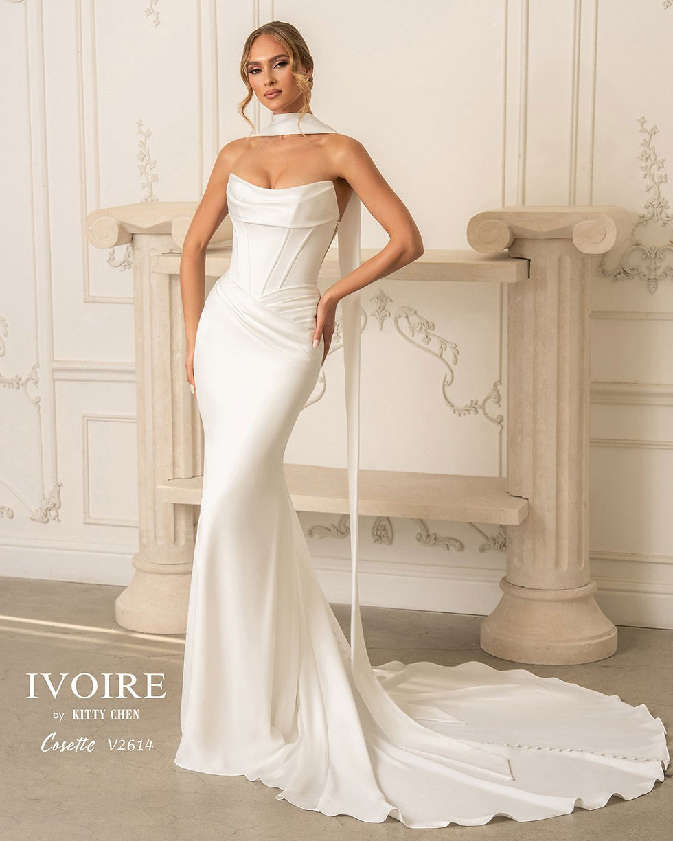 front view of Cosette cape mermaid wedding dress