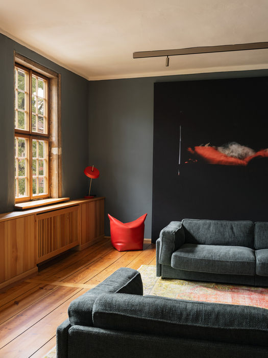 Living room interior of Concept Space, Potsdam — warm atmosphere and natural light