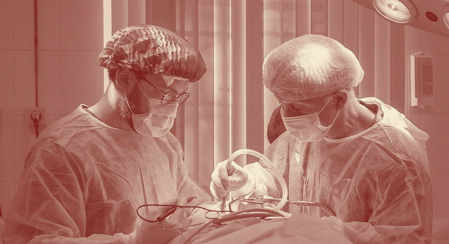 two men wearing blue lab coats_edited.jp