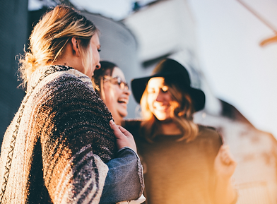 Picture of women laughing in a theraputic way, therapy for burnout NC
