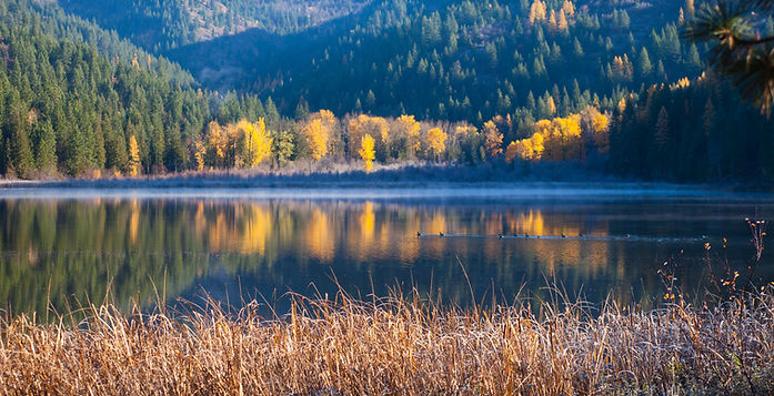 Nature photography of a North Idaho Lake surrounded by mountains