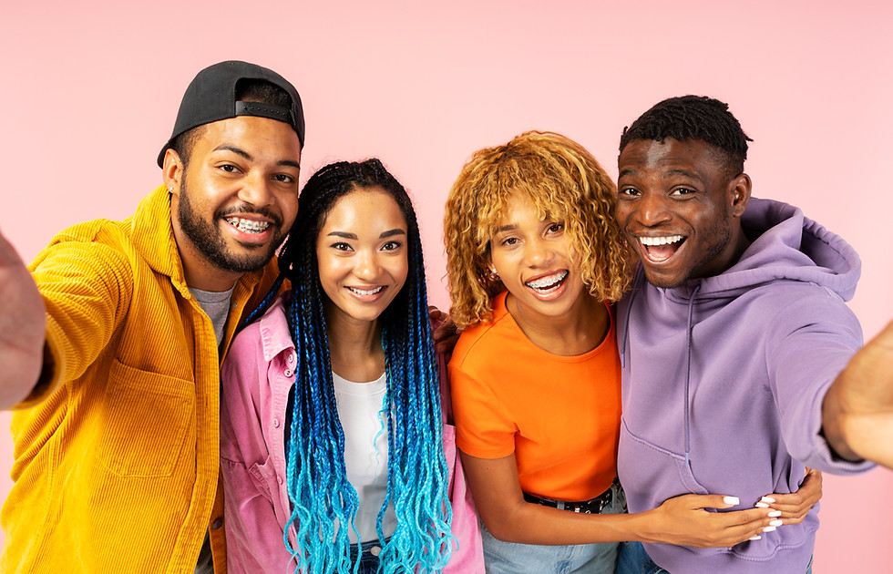 four-young-adults-smiling-together-in-a-studio-2026-01-08-02-37-17-utc.jpg
