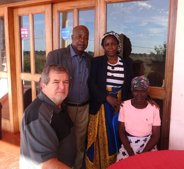 Ed, Papa and Mama Rego, with grandmother of raised from the dead granddaughter