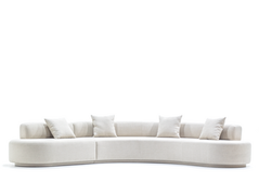 O Sofá Bloom traduz suavidade com elegância. Seu design com curvas delicadas e encosto levemente inclinado reforça uma estética fluida e acolhedora. Com formas orgânicas e proporções bem equilibradas, ele é ideal para quem busca um ambiente confortável, com presença sutil e toque sofisticado.