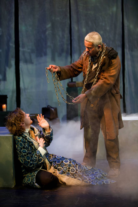 Jacob Marley shows Scrooge the chains