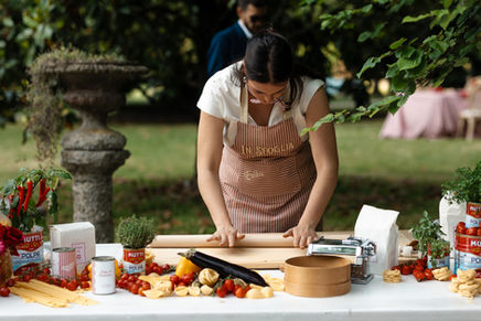 Italian cooking experience with fresh pasta workshop during a destination wedding in Italy