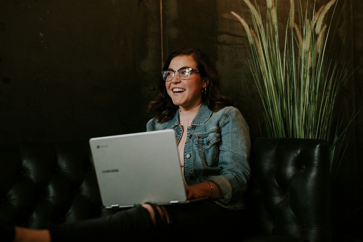 Illustrative stock portrait; not a photograph of Maya Chen