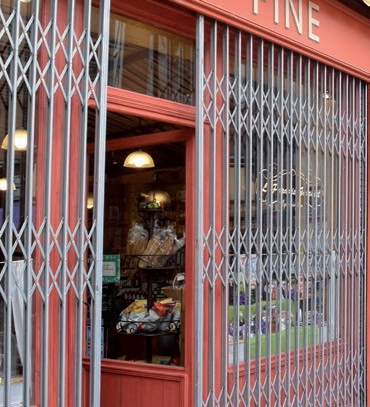 grille extensible à 2 vantaux pour securiser un magasin