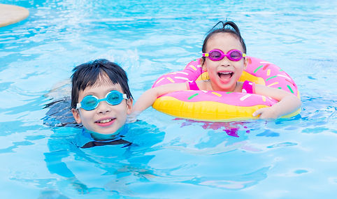 little-asian-siblings-happy-together-swimming-pool.jpg