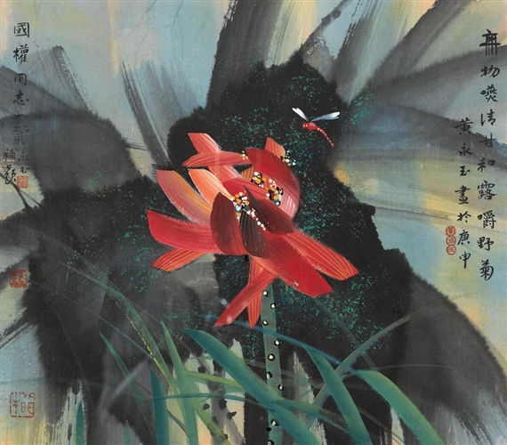 red lotus amongst grass
