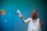 woman curator explaining art in an accessible manner
