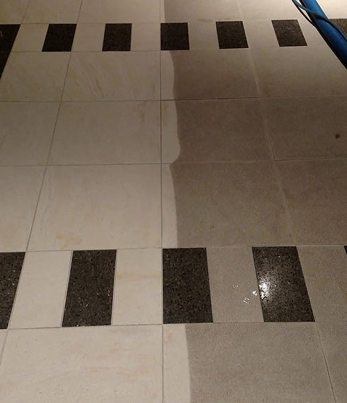 Before and after comparison photo of a tile floor after it has been professional cleaned by Lakes Region Tile and Grout