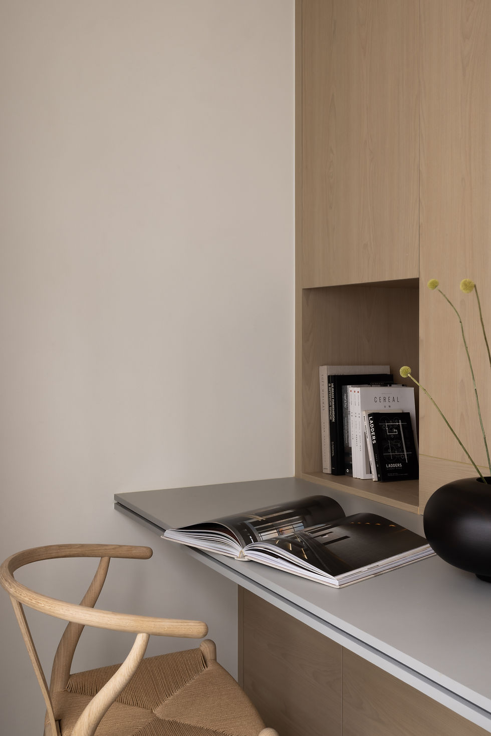 Hitotema Home study desk integrated into a compact workspace, with built-in storage concealed within the wall.