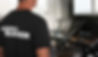 Professional personal trainer in gym Space for text.jpg