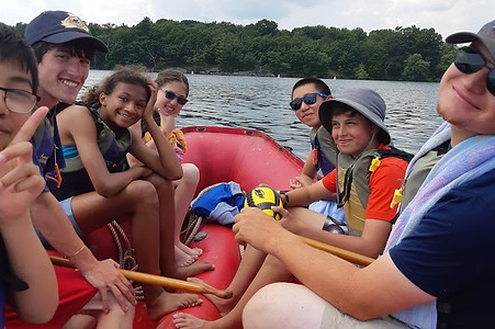 Trainees on a raft. Summer camp.