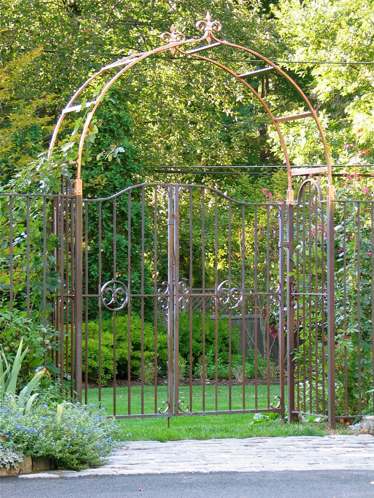 18. Solid Copper Garden Gates