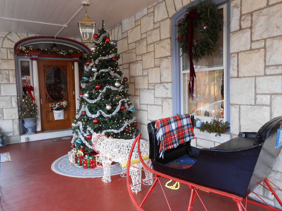 Front porch decorated for winter holidays